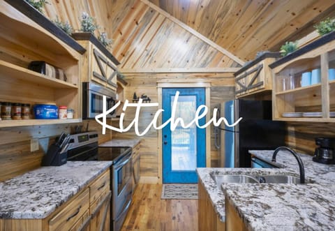 This kitchen makes meal prep easy, with plenty of space and modern amenities at your fingertips.