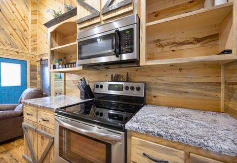 Prepare your favorite meals on this well-equipped stove and spacious countertop.