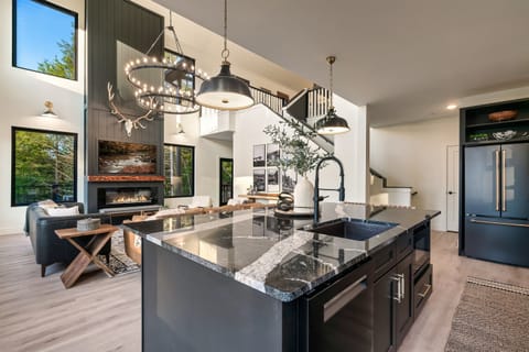 Open-concept kitchen & dining area — gather, cook & enjoy meals together