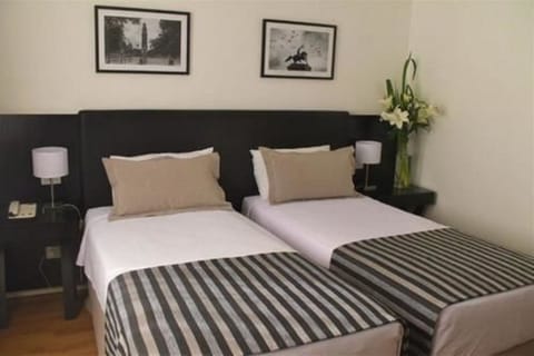 Hypo-allergenic bedding, minibar, in-room safe, desk