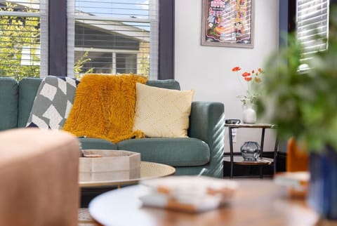 Bright and inviting, the living room is a cozy retreat after a day exploring Bristol.