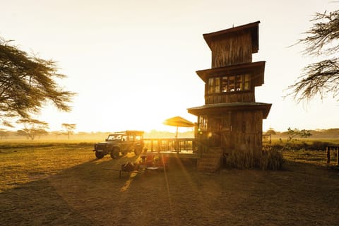 exterior, view of front door at sunrise