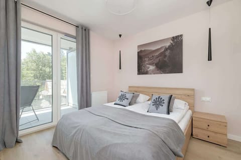 The bedroom's elegant decor creates a serene and restful environment.