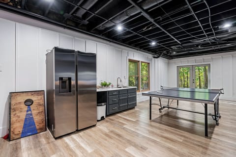 The entertainment room has a double-door fridge as well!