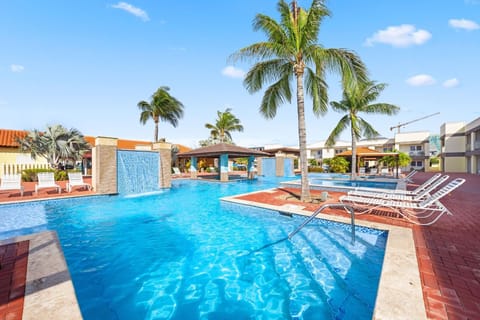 Our stunning pool area offers the perfect blend of fun and tranquility. Dive into crystal-clear waters, lounge on stylish chairs, or soak in the sun while surrounded by lush landscaping.