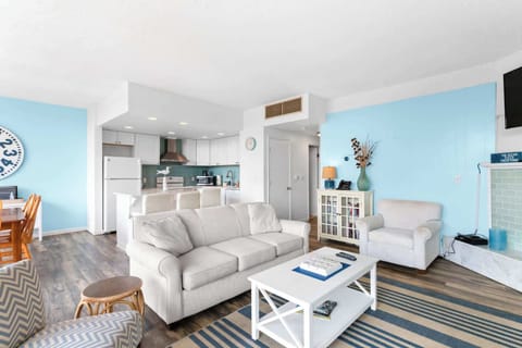 Enjoy the company of loved ones in this spacious and comfortable living room. 