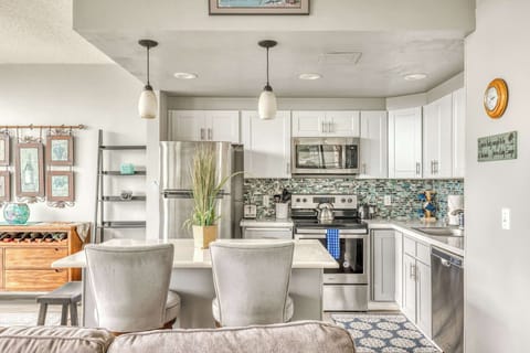 Functional kitchen providing essential appliances creating a clean and practical cooking space. 