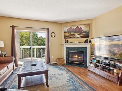 Spacious Living Room with Gas Fireplace, Sleeper Sofa and SMART TV with Cable & WIFI throughout vacation rental