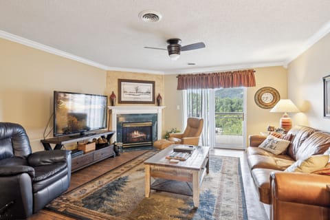 Spacious Living Room with Gas Fireplace, Sleeper Sofa and SMART TV with Cable & WIFI throughout vacation rental