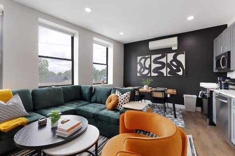 Relax in this warm, inviting space with warm accents and cozy furnishings. You’ll love unwinding on the plush sofa, enjoying or streaming your favorite shows in a serene atmosphere