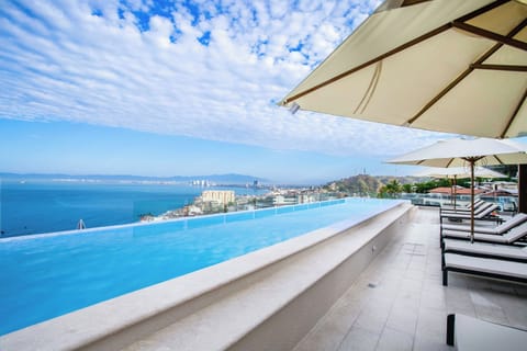 Elevate your stay at this luxury 1-bedroom condo in Amapas, steps away from the Romantic Zone