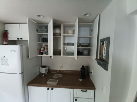 full set of dishware, espresso and kcup maker, toaster, full glassware