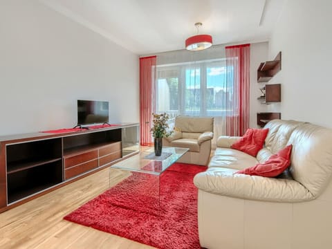 Comfortable Living Room with Sofa Bed and Smart TV | Book Now with RENTUJEMY
