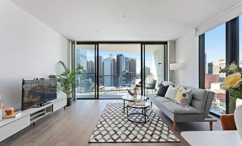 Comfortable lounge space with sofa bed and natural light