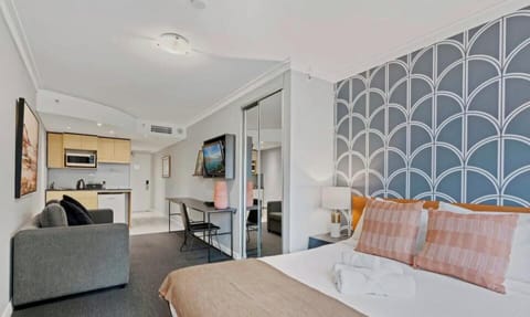 Bright and comfy sleeping area with fresh bedding