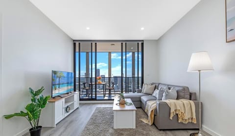 Spacious living area with a sofa bed and warm homey feel