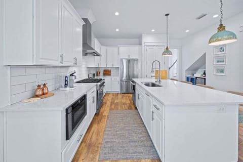 Clean lines, luxury appliances, and room to gather.