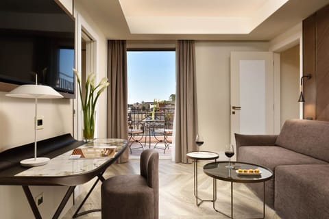 Suite with Jacuzzi Balcony Iconic View | Living area | 55-inch LCD TV with satellite channels