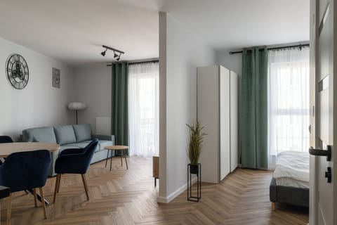Apartment, 1 Bedroom, Balcony | Living area | Flat-screen TV