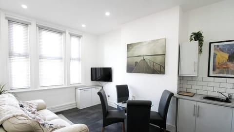 Have comfortable access to a cream leather sofa, wind down after a long day watching your favourite shows on a wall mounted TV. 