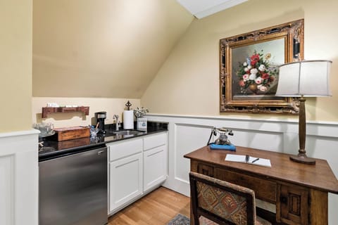 Stairwell landing, coffee service and upstairs refrigerator