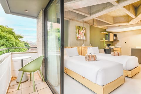 Deluxe Duplex, 2 Twin Beds | View from room
