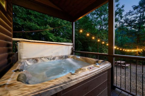 Relax and rejuvenate in style—our cabin’s hot tub is your personal retreat to bliss.