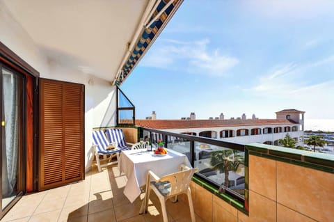 Balcony with Ocean View, Sun Loungers, Dining Table and Chairs