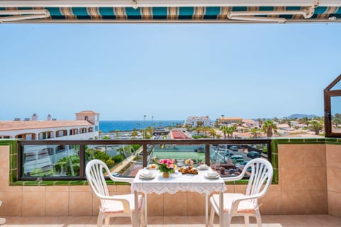 Balcony with Ocean View, Sun Loungers, Dining Table and Chairs
