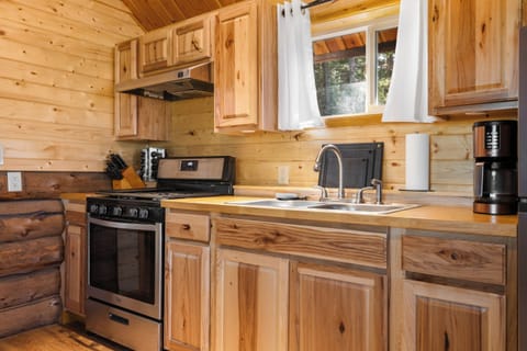 Kitchen has a coffee maker (coffee provided!), oven, and stove. 