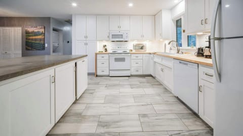 Kitchen: Modern and inviting, our kitchen is perfect for preparing delicious meals and making memories during your stay!