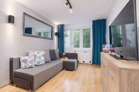 Bright lounge with a comfortable sofa and modern decor.

