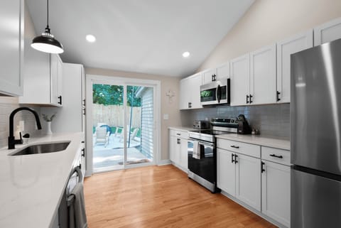 The kitchen is equipped with essentials for cooking a delicious meal. 
