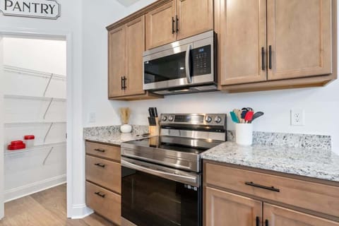 The condo boasts all new appliances and a convenient walk-in pantry, enhancing your cooking and storage experience.