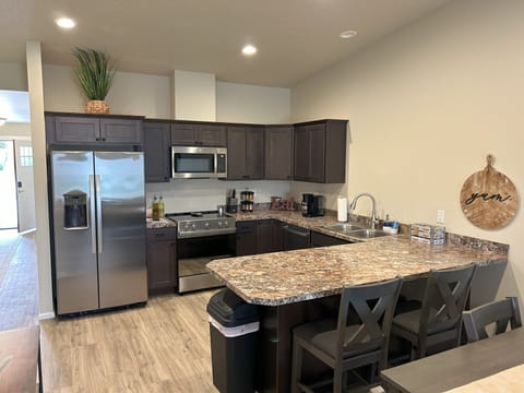 Kitchen with Fridge, Ice/Water Dispenser, Oven, Microwave, Garbage Disposal