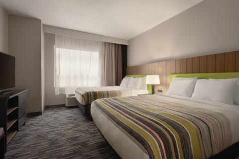 Desk, blackout drapes, iron/ironing board, free cribs/infant beds