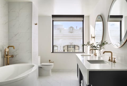 Luxury Suite, 1 Bedroom | Bathroom | Designer toiletries, hair dryer, bathrobes, slippers