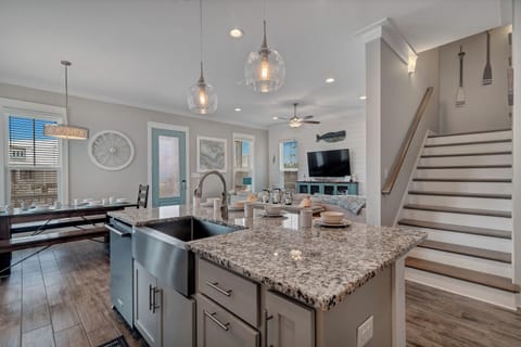 The open floor plan ensures you won't miss a beat no matter where you are