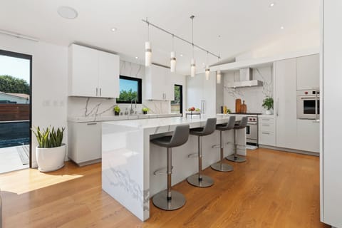 Stylish bar chairs and table in the kitchen for casual dining and gatherings.