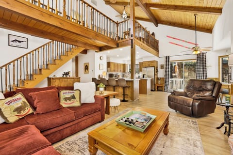 Spacious welcoming living room opens to dining area and kitchen