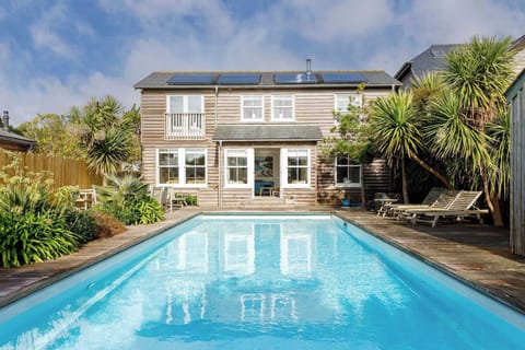 Our spacious swimming pool area is ideal for sunbathing and enjoying the beautiful West Wittering weather