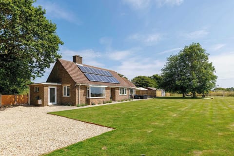This beautiful and quaint countryside cottage sits in half an acre of land.