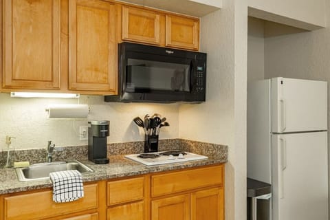 Whip up something simple or brew a fresh cup of coffee—everything you need is within arm’s reach.