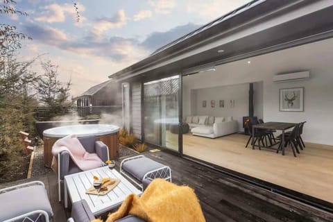 Relax in the private backyard with Hot tub and outdoor patio 