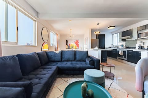 Deluxe Apartment, 5 Bedrooms | Living area | TV