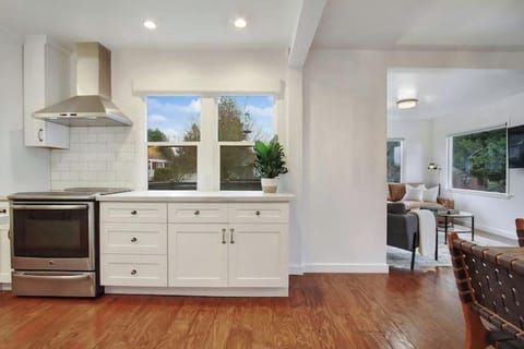 Kitchen, living area, and dining area all open for great flow