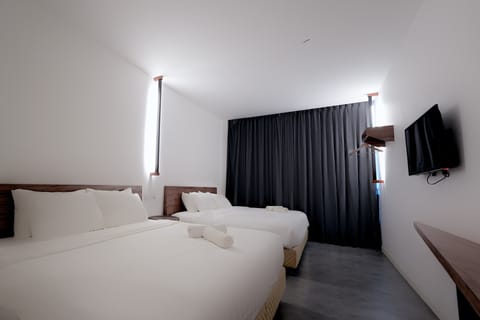 Deluxe Quadruple Room, Multiple Bedrooms, Non Smoking | Desk, free WiFi