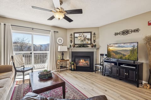 Spacious Living Room with Gas Fireplace, Sleeper Sofa and SMART TV with Cable & WIFI throughout vacation rental