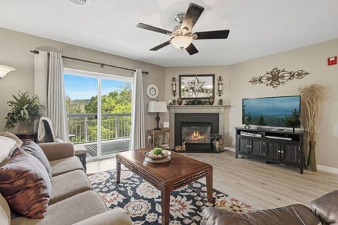 Spacious Living Room with Seasonal Gas Fireplace, Sleeper Sofa and SMART TV with Cable & WIFI throughout vacation rental