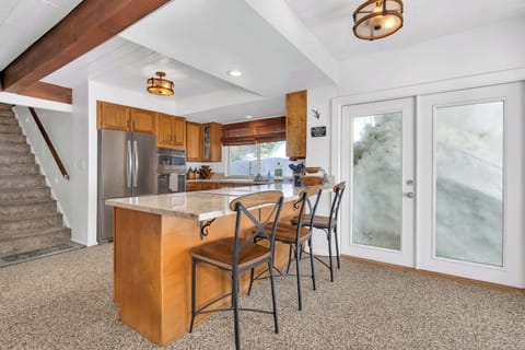 Kitchen bar counter with seating for 3